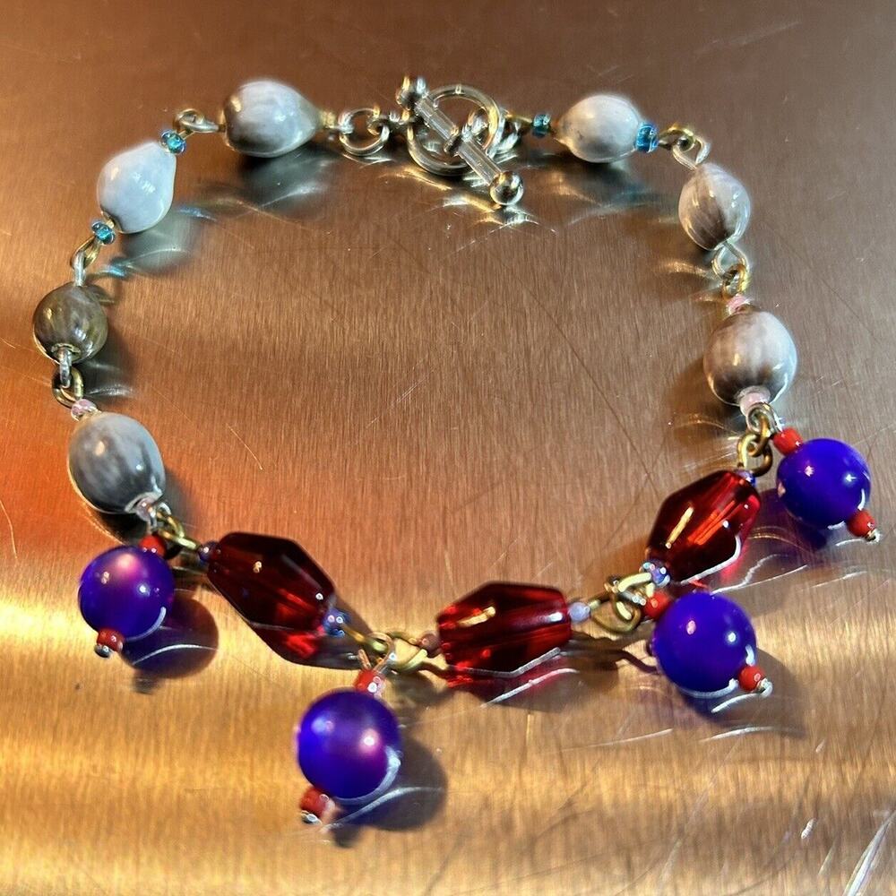 Job’s Tears joined w/red & purple beads on a metal linked bracelet - 8” Long